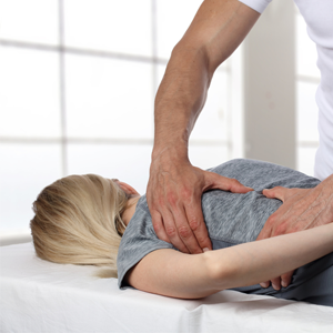 ballard-chiropractic-buford-lawrenceville-chiropractor-spine-adjustment-side-back-pain